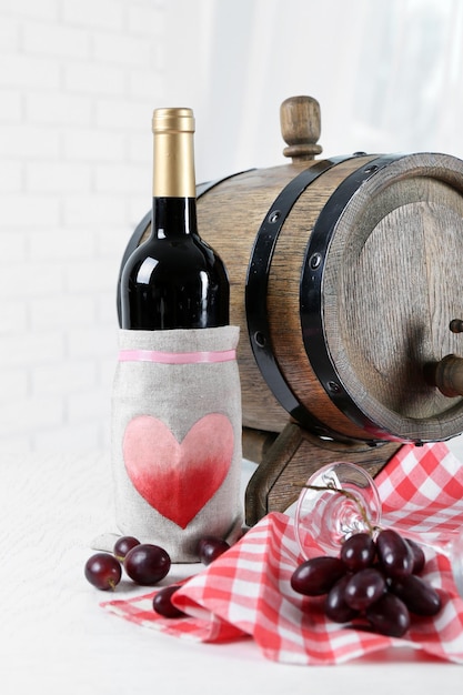 Beautiful still life with wine and grape on table