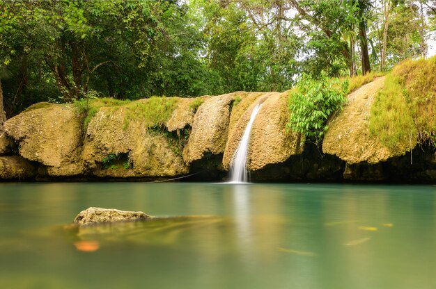 A beautiful stream water famous rainforest waterfall in Thailand