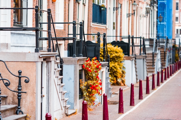 Beautiful street and old houses in Amsterdam, Netherlands, North Holland province. Outdoor photo.