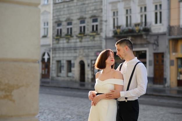 Beautiful stylish couple on a date on the streets in the old city.