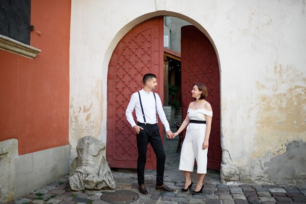 Beautiful stylish couple on a date on the streets in the old city.