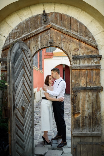 Beautiful stylish couple on a date on the streets in the old city.