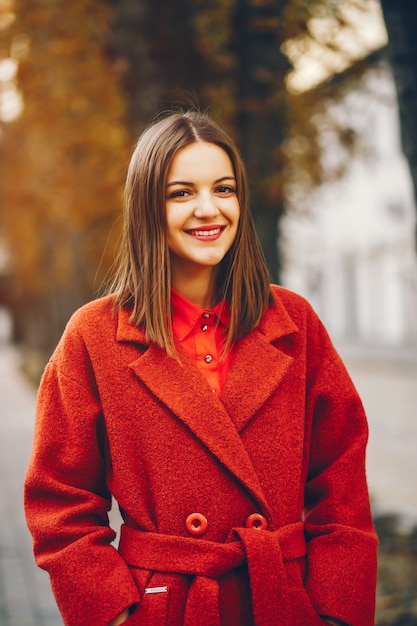 beautiful and stylish girl walking around the summer city