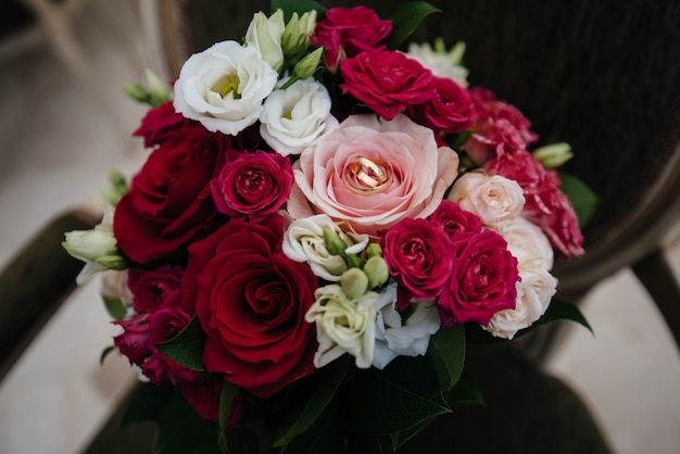 Beautiful stylish wedding bouquet close-up on the chair. Wedding Floristics