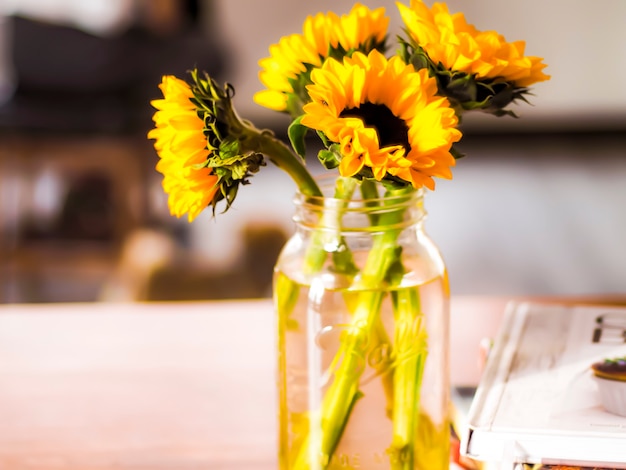 Beautiful Sunflower Flowers In A glass Vase .