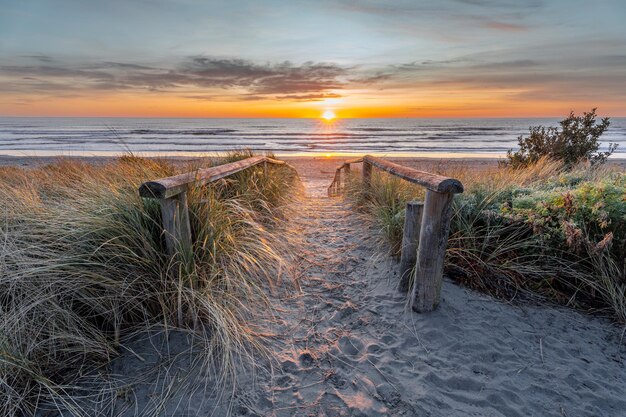 Photo beautiful sunrise at new brighton beach christchurch new zealand