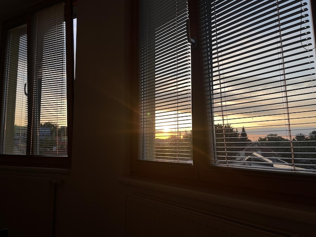 Beautiful sunrise of a new day seen in the window of a cozy\
home