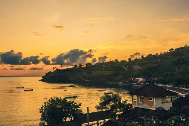 Beautiful sunrise over the sea at Amed beach, Bali, Indonesia