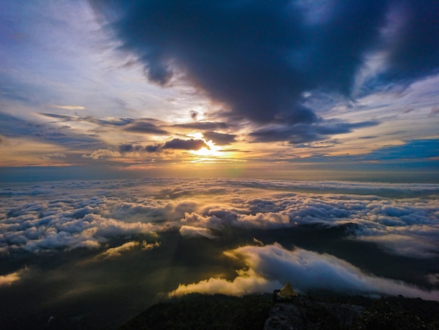 Beautiful Sunrise Sky with Sea of the mist of fog in the morning on Khao Luang mountain in Ramkhamhaeng National Park,Sukhothai province Thailand