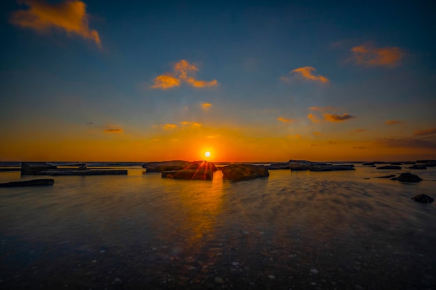 beautiful sunset exposure on the rocky beach