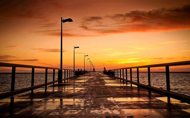 Beautiful sunset over a long jetty