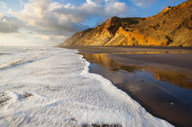 Beautiful Sunset at the Ocean Beach, New Zealand.