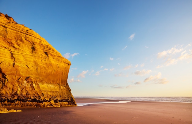 Beautiful Sunset at the Ocean Beach, New Zealand.