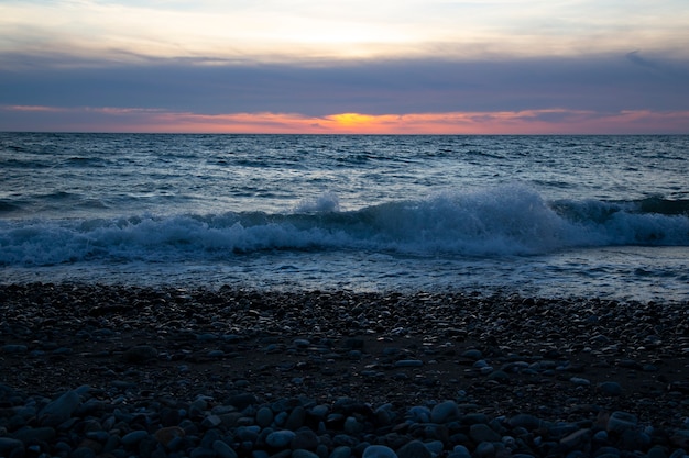 Beautiful sunset above the sea The setting sun over the ocean, in the evening