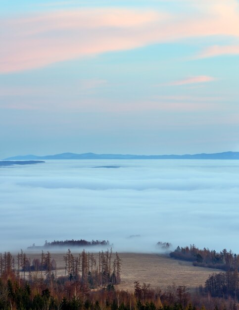 Beautiful sunset view with pink clouds over foothills. High Tatras (Slovakia)