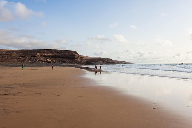 beautiful sunset with reflections in the sands at Playa de Garcey