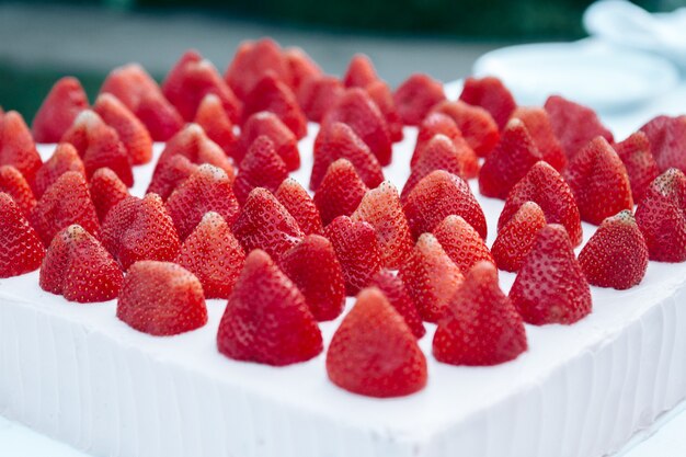 Beautiful sweet wedding cake with strawberries