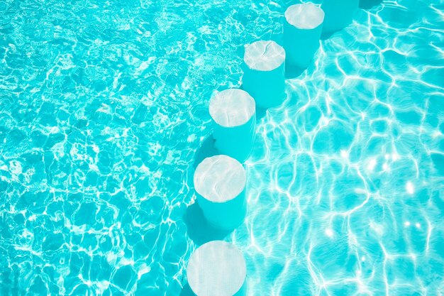 Beautiful swimming pool at the seaside hotel in park background