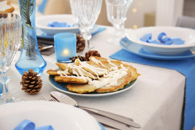 Beautiful table setting for Hanukkah closeup