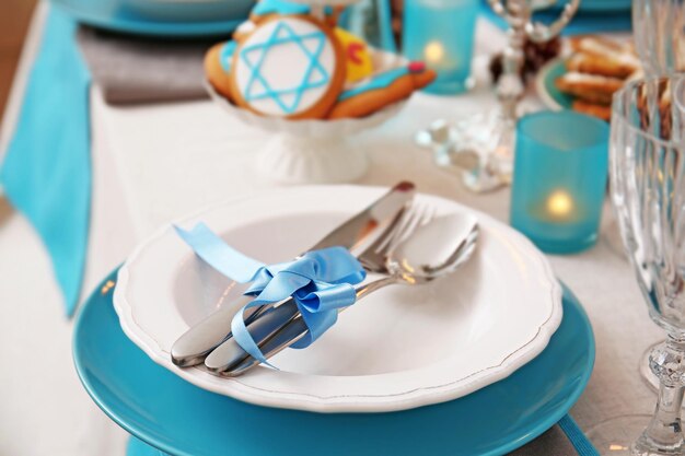 Beautiful table setting for Hanukkah closeup