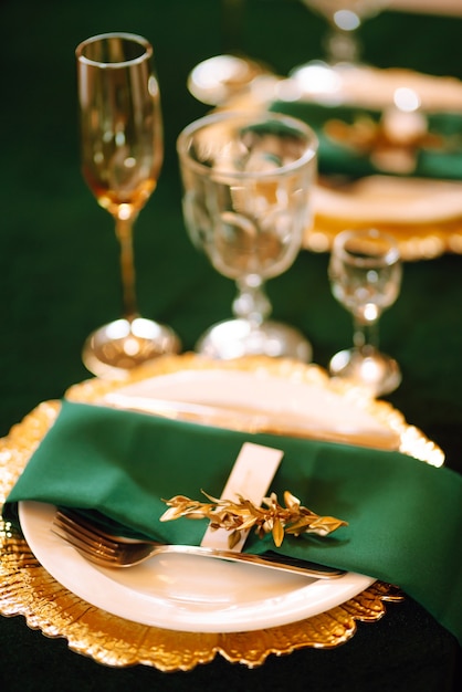 Beautiful table setting for a party wedding reception or other festive event emerald colour