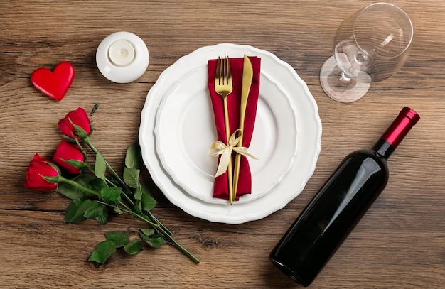 beautiful table setting for valentine39s day dinner on wooden background flat lay