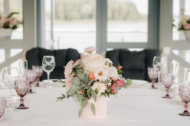 Beautiful table setting with floral decor for a holiday