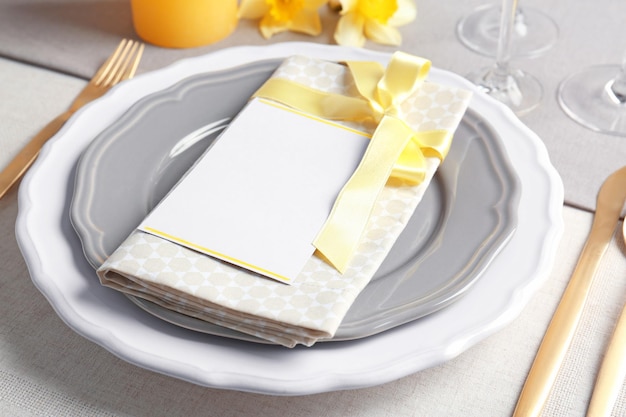 beautiful table setting with golden flatware