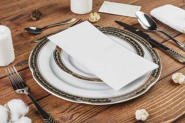 Beautiful table setting on wooden table from above