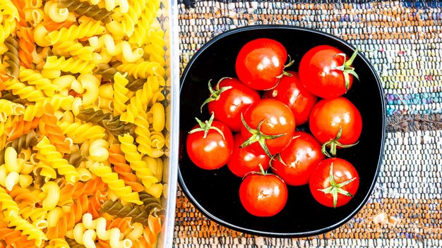 Beautiful tasty italian pasta tomatoes onions and garlic for cooking pasta