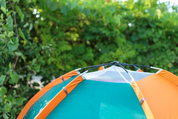 Beautiful tent in the forest closeupCamping in the backyard