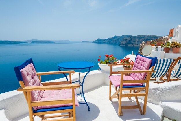 Beautiful terrace with sea view. White architecture on Santorini island, Greece.