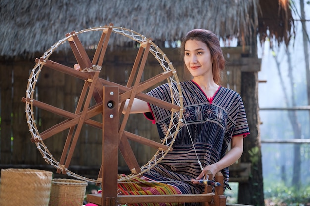 Beautiful Thai woman smile in karen suit 