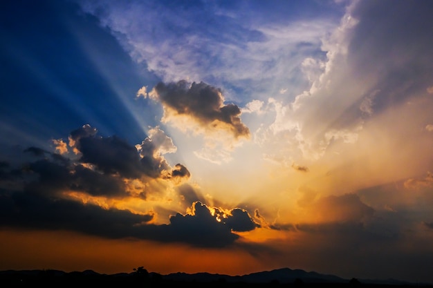 Beautiful Thailand sunset with striking beams of sunlight background