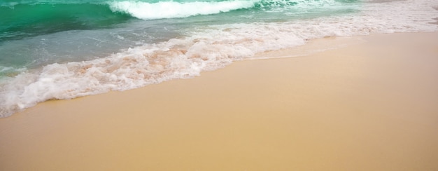 Beautiful tropical beach and ocean wave