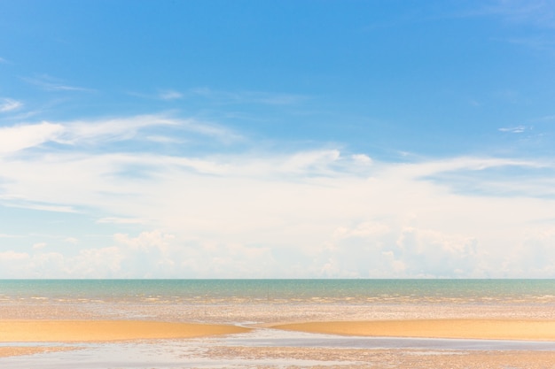 Beautiful tropical sand beach with sunny blue sky