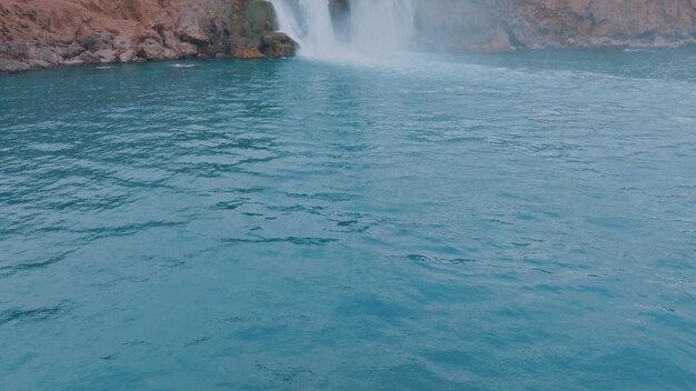 Beautiful turquoise lagoon in a tourist place Waterfall Harmony with nature Pure water Aerial drone view