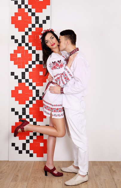 Beautiful ukrainian couple dressed in traditional costumes