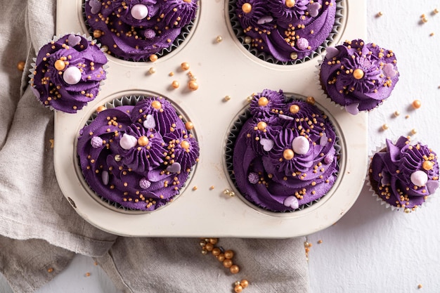 Beautiful and unique cupcakes as purple flower shape