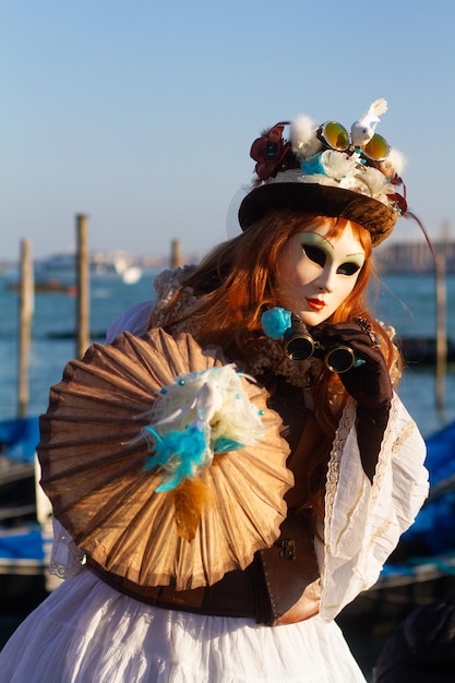 Beautiful venetian masks on people during carnival in venice