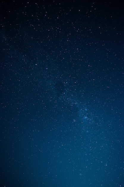 Beautiful vertical shot of a starry night sky