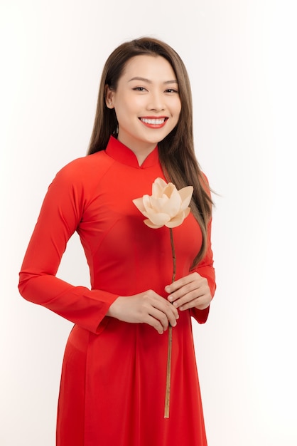 Beautiful Vietnamese woman with lotus flowers