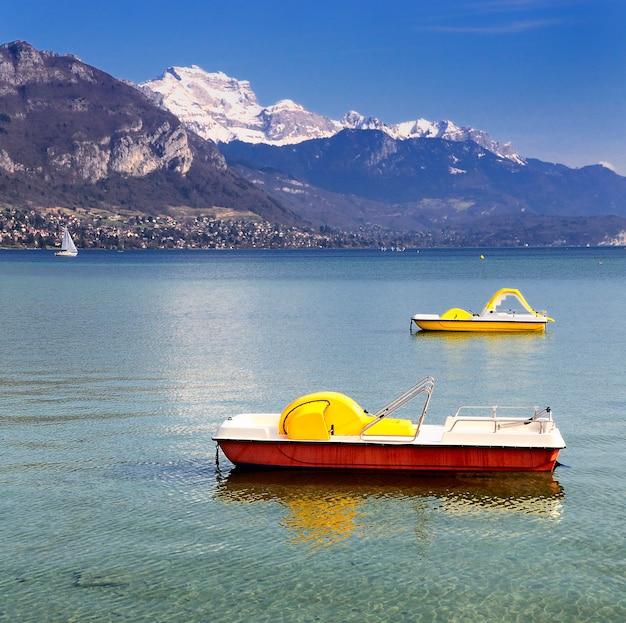 Beautiful view of the Annecy Lake in French Alps with boats