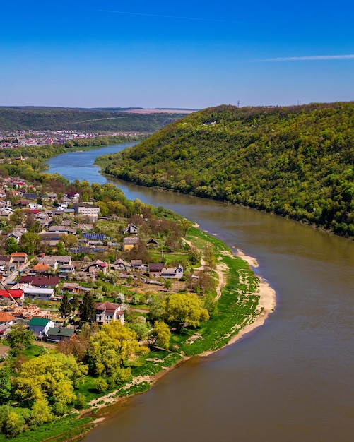 Beautiful view of the canyon with the river Dniester and the city in summer Zalischyky
