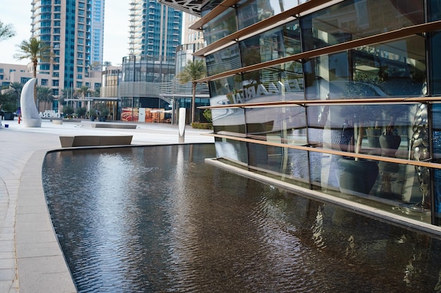 Beautiful view to Dubai downtown city center skyline from District at evening United Arab Emirates