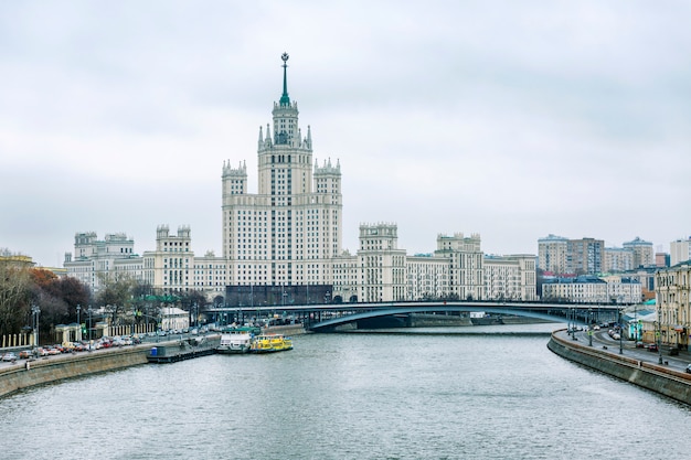 Beautiful view of the embankment and architecture in the center of Moscow on a cloudy autumn day.