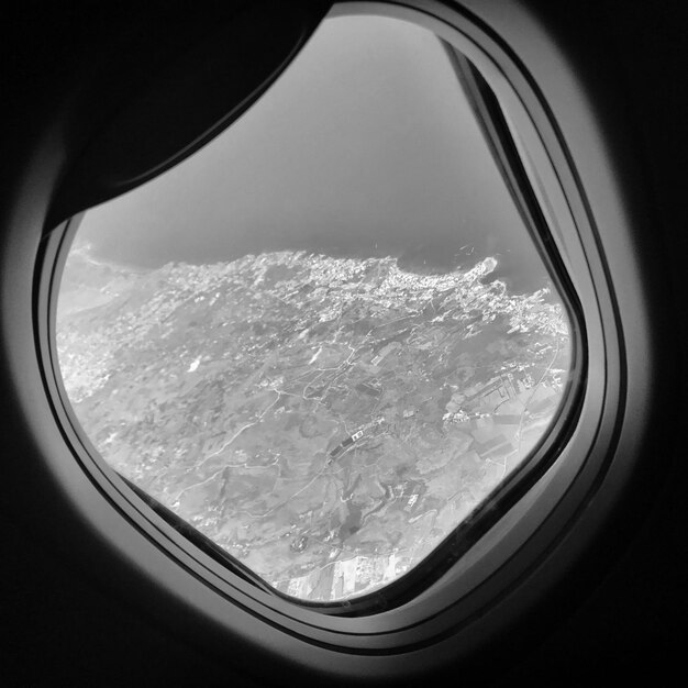 Beautiful view from airplane window large wing of aircraft shows casement