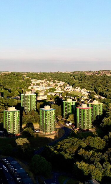A beautiful view of green buildings in gleadless valley full of trees in sheffield