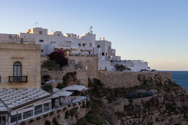 Beautiful view of the houses on the rock in Polignano a Mare