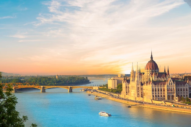 Beautiful view of the Hungarian Parliament and the chain bridge in the panorama of Budapest at night